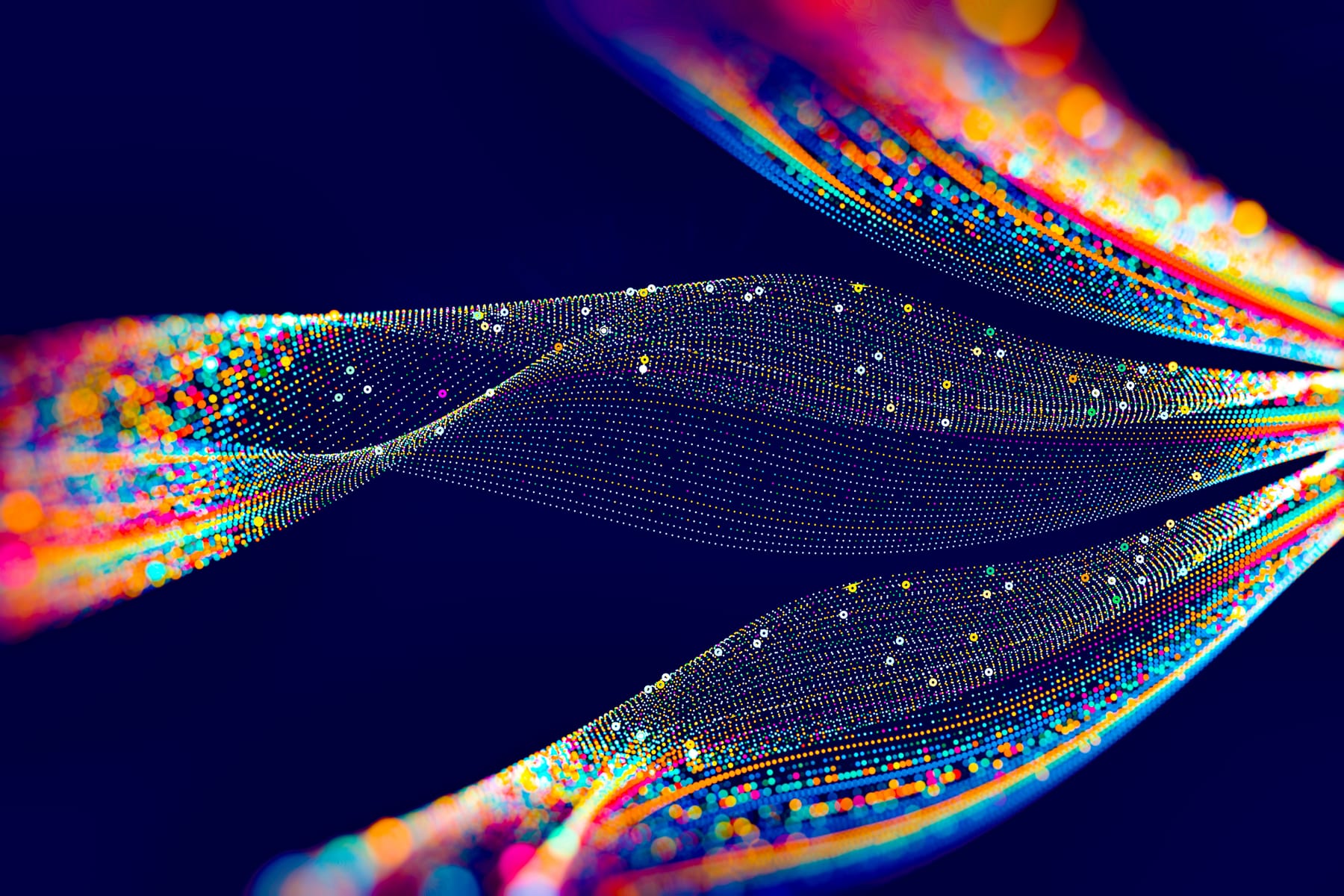 Abstract multicolored particle streams converging on a dark navy background.